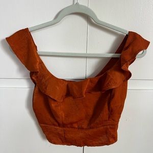 Burnt orange-colored shirt